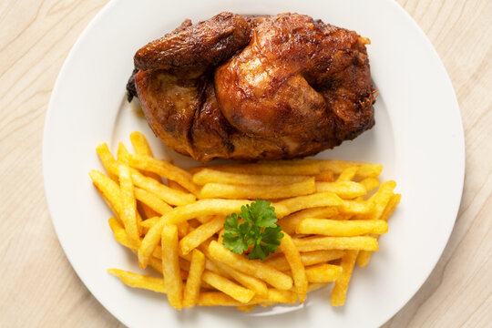 Halbes Grillh&auml;hnchen mit Pommes Frites