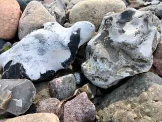 Beautiful marble stones on a rocky beach 