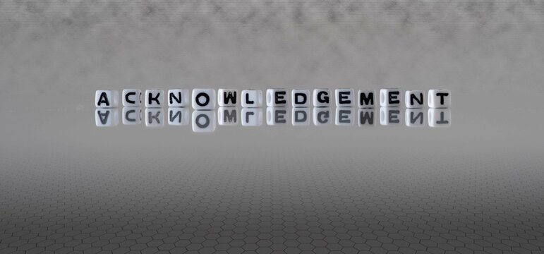 acknowledgement word or concept represented by black and white letter cubes on a grey horizon background stretching to infinity