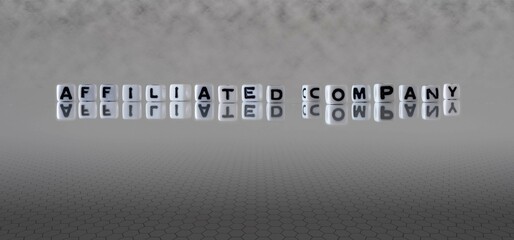 affiliated company word or concept represented by black and white letter cubes on a grey horizon background stretching to infinity - obrazy, fototapety, plakaty