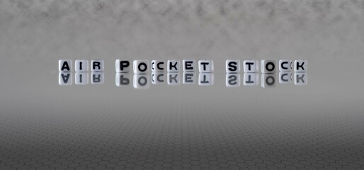 air pocket stock word or concept represented by black and white letter cubes on a grey horizon...
