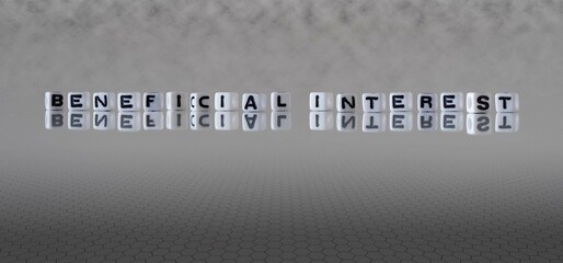 beneficial interest word or concept represented by black and white letter cubes on a grey horizon background stretching to infinity