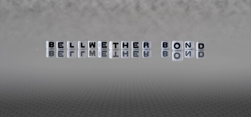 bellwether bond word or concept represented by black and white letter cubes on a grey horizon...