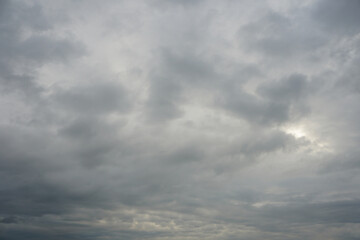 Dark and grey featureless layers of nimbostratus clouds. 