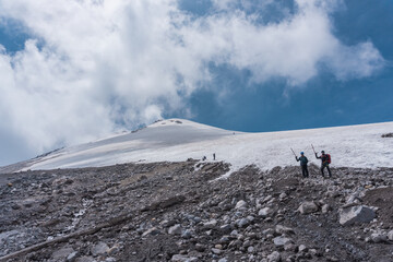 two mountaineers walking on the ice