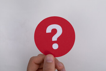 question marks on sheet of paper