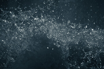 Scattered water particles. Beautiful highlights and bokeh