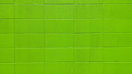 Rough green brick block background texture.