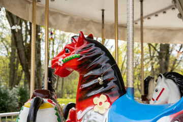 Fototapeta na wymiar hobbyhorse in a children's carousel