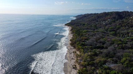 Aerial view of the beach in Costa Rica, Central America. Costa Rica has fantastic beaches and stunning landscapes with lots of nature. The country is famous for ecotourism. 
