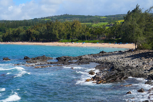 D.T. Fleming Park beach as seen from Makaluapuna Point in West Maui, Hawaii - Rocky coastline with high surf in the Pacific Ocean