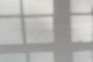 Top view flat lay background with organic window lights and shadows, bokeh, and texture on a...