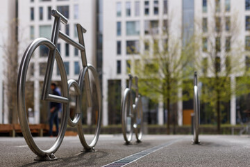 Designer bike parking, modern style. Metal frames in the shape of a bicycle.