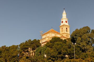 Church on the top of the tree-filled hill in Motril, Granda, Andalucia, Spain
