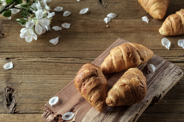 croissant on wooden table