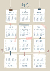 2023 calendar template. Each month is framed in the form of a piece of paper pinned or taped to wall. Week starts on Sunday. Vector illustration, vertical A4 format.