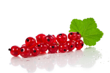 Red currant berries with leaf isolated on a white background.