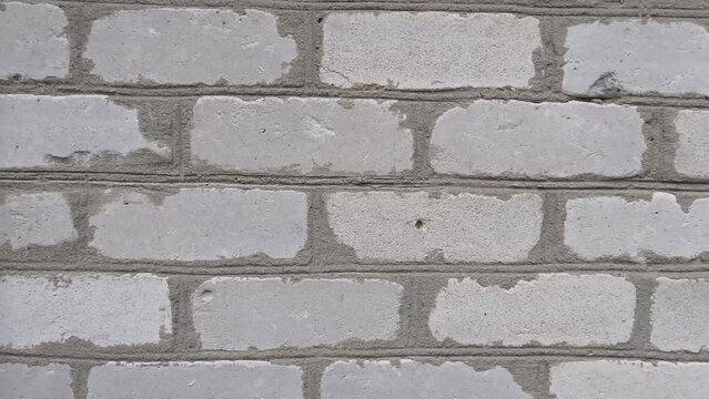 Тexture of a brick wall. The wall is made of bricks.	