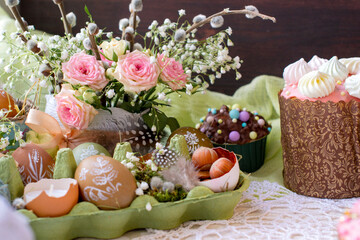 Obraz na płótnie Canvas Festive Easter table with decor and cakes