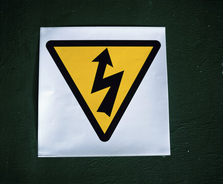 Close-up of an electric shock warning sign