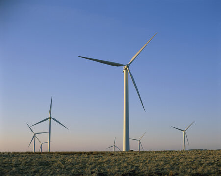 Low angle view of wind turbines, Scotland