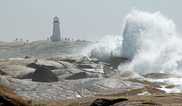 Canada, Nova Scotia, Peggy's Cove, High surf after hurricane crashing on rocks