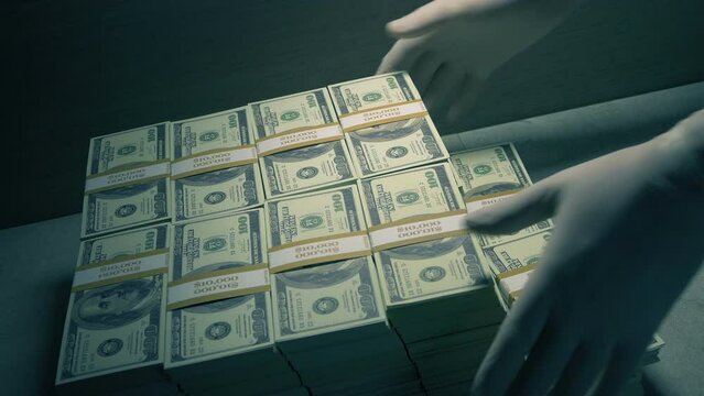 Man Grabs Stacks Of Money During Bank Heist