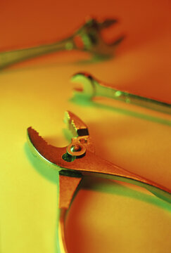 Close-up of pliers and a wrench