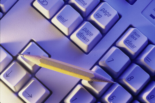 High angle view of a pencil on a computer keyboard