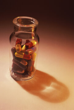Close-up of capsules in an open bottle