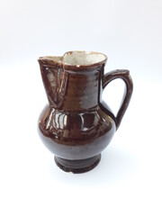 Antique ceramic water jug isolated
