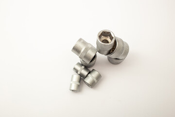 Construction tools, wrench heads on white background