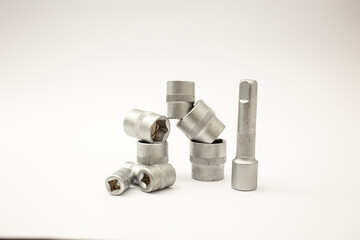 Construction tools, wrench heads on white background