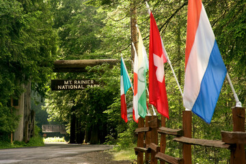 National flags of Netherlands, Switzerland, India and Italy at the road side, Mount Rainier National Park, Washington State, USA