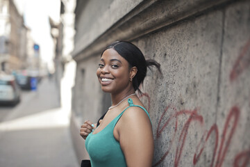 Fototapeta premium portrait of a young woman in the street