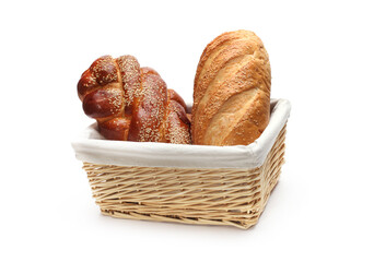 Baked bread in wicker basket on white background.