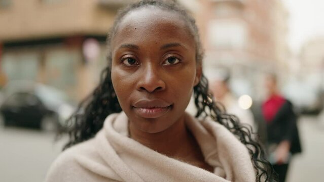 African american woman smiling confident standing at street