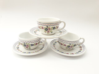 Vintage coffee cup set with folk art pattern
