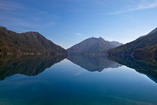 Reflection of mountains in a lake, Lake Crescent, Olympic National Park, Washington State, USA