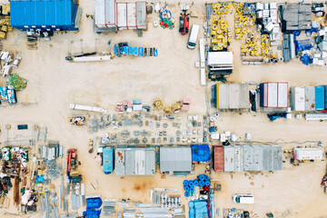 Factory Building. Aerial Industrial Construction Site with Crane and Construction Equipment.