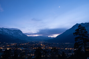 Landscape with view of Garmisch-Partenkirchen at sunset