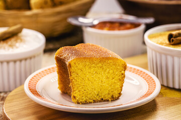 slice of cornmeal cake, traditional homemade corn cake from Brazil in June parties, with rustic...