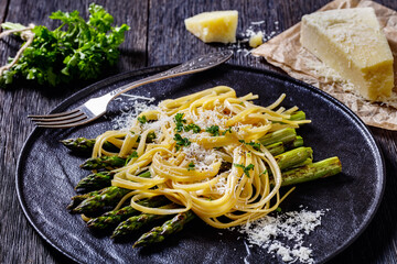 roasted asparagus with pasta, cheese on plate