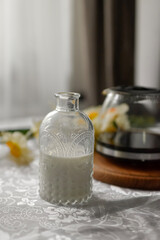 Breakfast table seating with coffee cup and milk