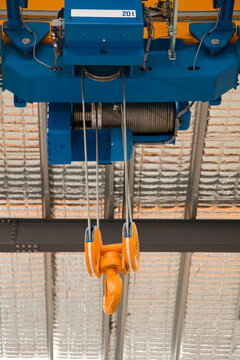 Low angle view of an overhead crane in a factory