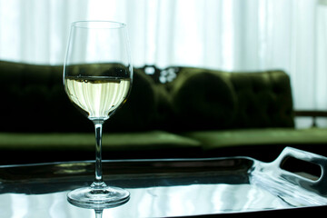 Wine glass on a serving tray