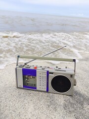 80s radio cassette recorder on the beach