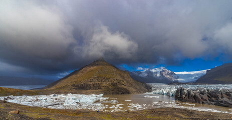 Glacier tongue end melting and forming a lake, a tourist attraction