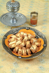 Biscuits, Cake, cookies served with tea offered at the wedding and Eid al-Fitr. 