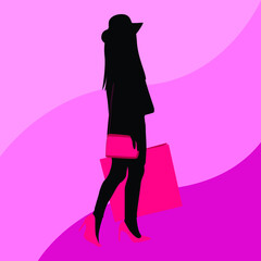 Silhouette of a woman with shopping bags